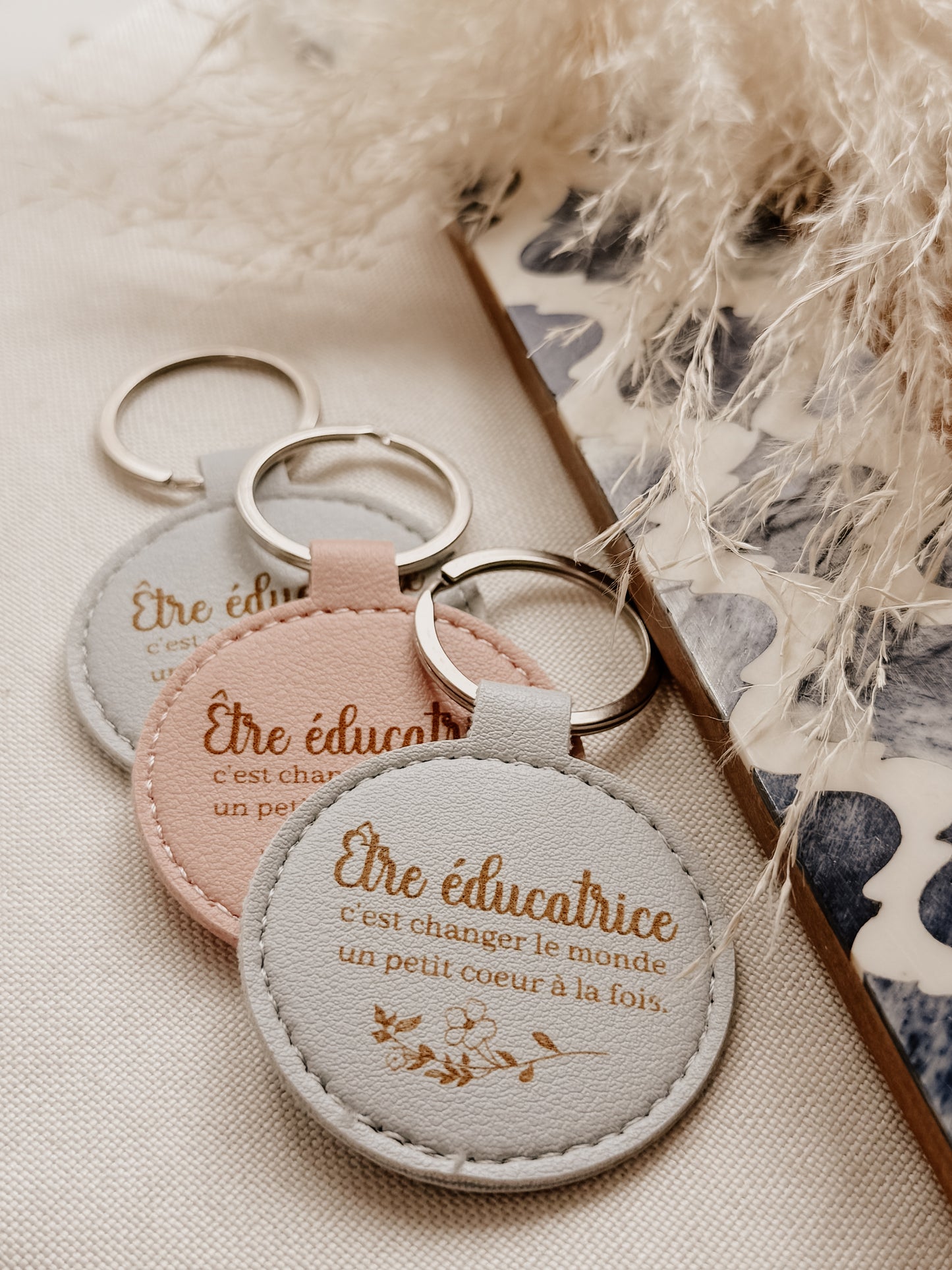 Porte clés - éducatrice